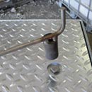 Special Tool both Unlocks & Aids in Cover Lift Photo Link